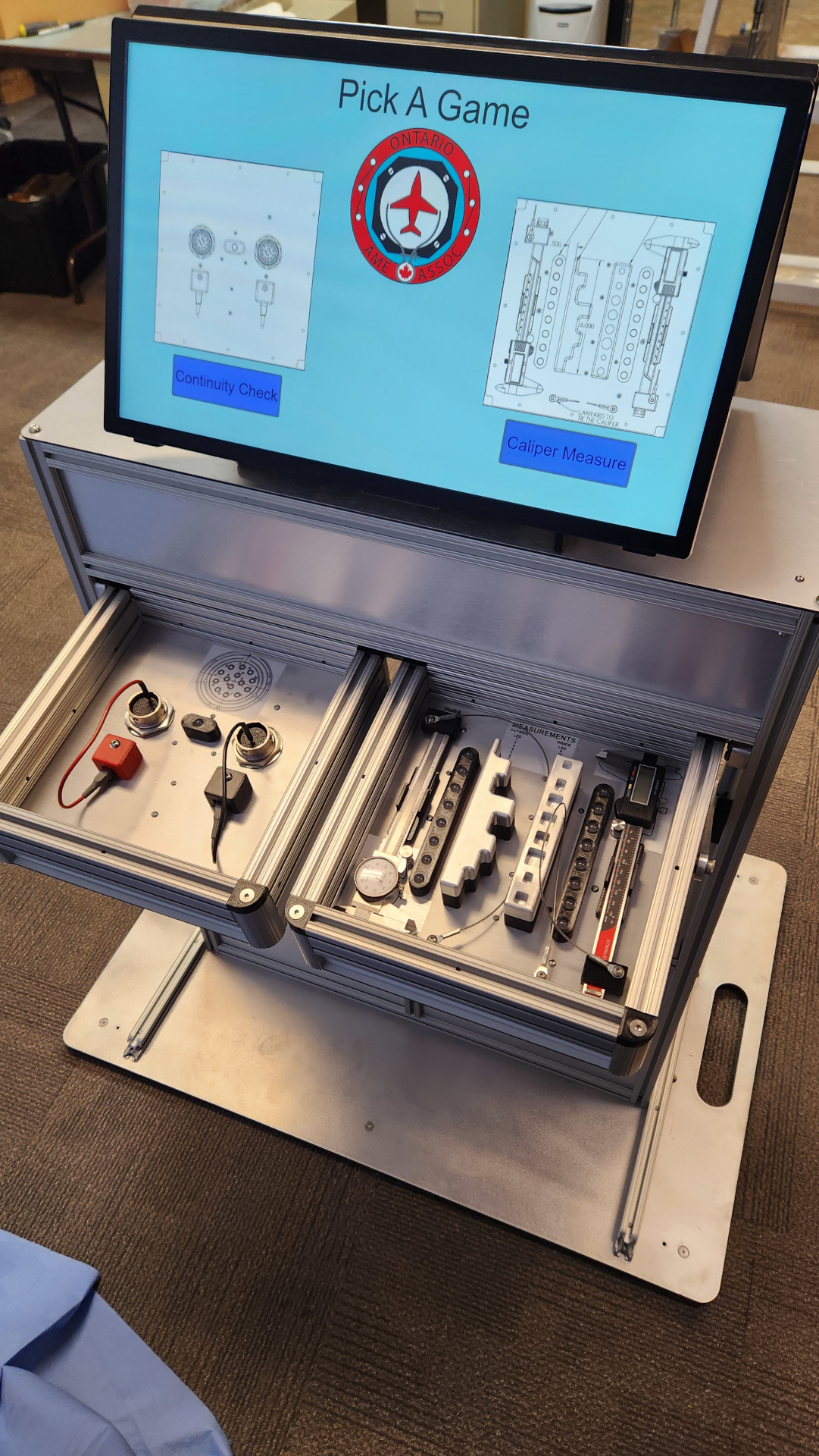 Picture of exhibit with continuity and caliper games
